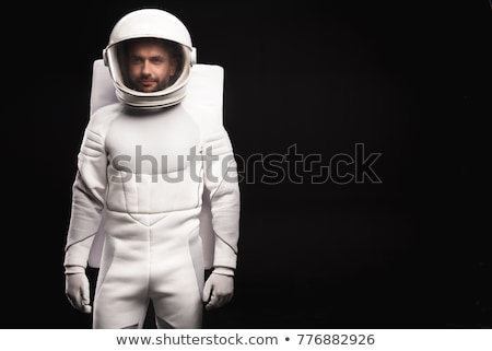 Сток-фото: Astronaut In Black Spacesuit Standing On Planet