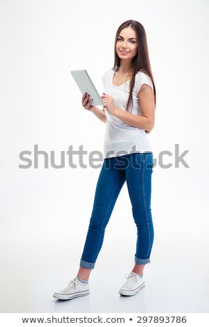 Foto stock: Portrait Of Beautiful Woman Holding Digital Tablet