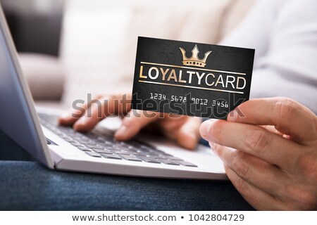 Stock foto: Mans Hand Holding Loyalty Card
