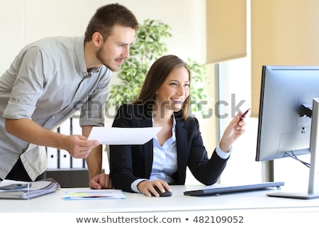 Stok fotoğraf: Auditors Working On Computer With Invoice