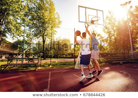 Two Friends Playing Basketball Stockfoto © MilanMarkovic78