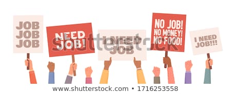 Foto stock: Activists Protestors With Placard Signs Protesting