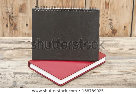 Zdjęcia stock: Desk Calendar With Red Leather Note Book On Wood Table