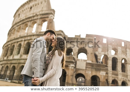 Zdjęcia stock: Loving Couple In Front Of The Colosseum In Rome Italy