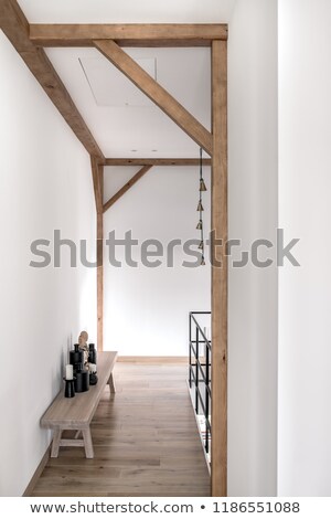 Stockfoto: Wooden Bench With Statuettes And Vases And Candlesticks