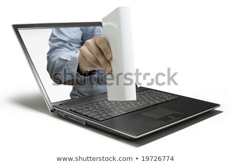 Stock foto: Hand With Book Coming Out Of Laptop