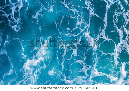 Stockfoto: Abstract Turquoise Sea Water With White Foam Waves For Natural Background Aerial Top View From Dron