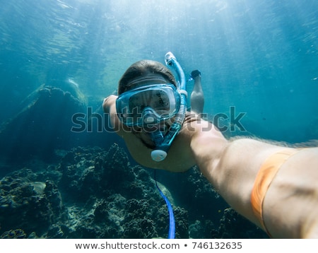 Stok fotoğraf: A Young Caucasian Snorkeling Man Under Water Selfie Thailand