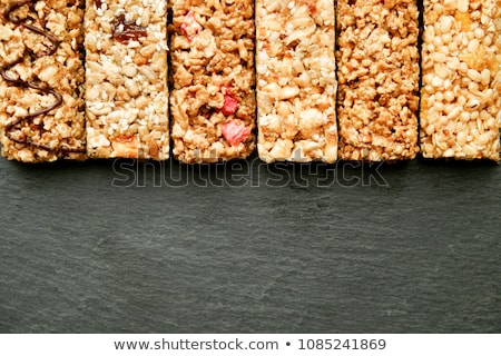 Stockfoto: Row Of Mixed Gluten Free Granola Cereal Energy Bars With Dried Fruits And Nuts