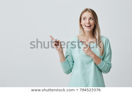 Сток-фото: Excited Woman Pointing At Something Interesting