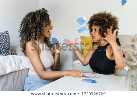 Foto d'archivio: Girl With Playing Cards