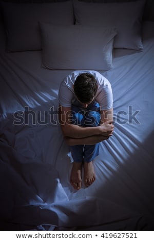 Stock photo: Young Man Suffering From Insomnia