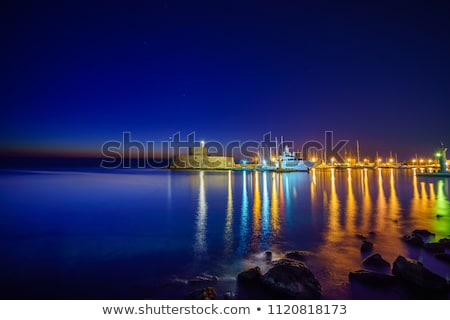 Stock photo: Fortress On The Mandraki Harbour Of Rhodes Greece