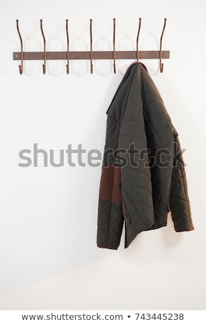 Stockfoto: Close Up Of Warm Clothes Hanging On Hook