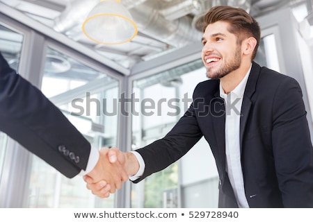 Foto stock: Smiling Successful Young Businessman