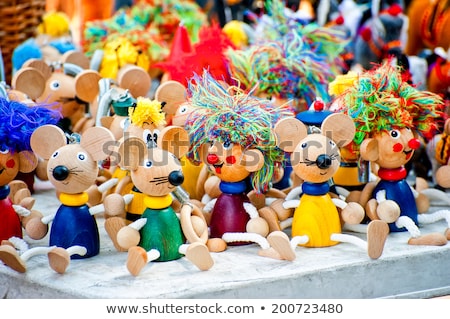 [[stock_photo]]: Antique Wooden Figurines Toys At The Fair