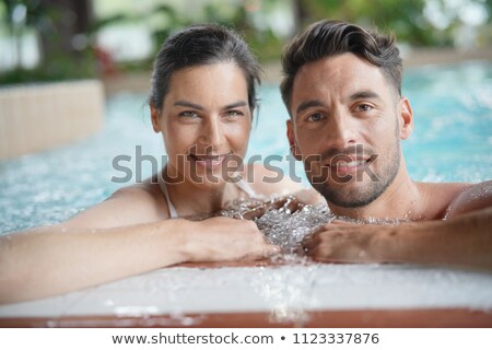 ストックフォト: Middle Aged Woman Bathing In Hot Tub