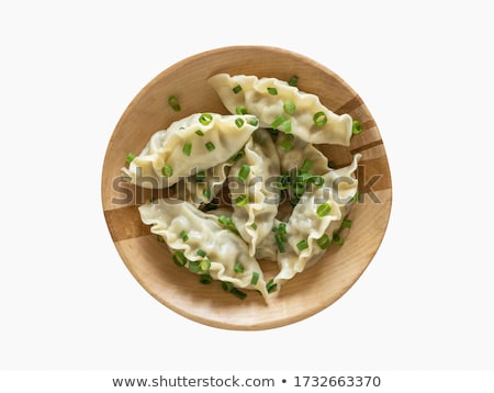 Foto d'archivio: Oriental Traditional Chinese Dumplings Served In The Wooden Steamer