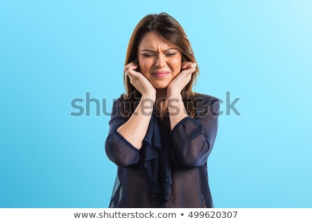 Stock photo: Woman Covering Her Ears With Finger