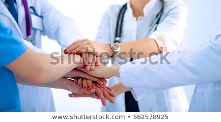 Zdjęcia stock: Attractive Caucasian Doctor And Team