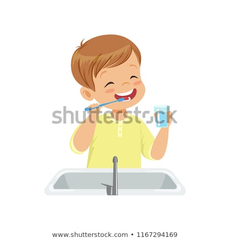 Сток-фото: A Boy Brushing His Teeth