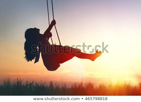 Foto stock: Swinging Girl