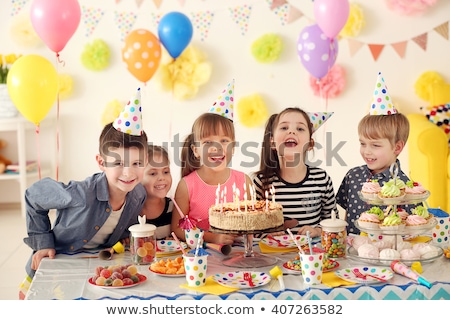 Stok fotoğraf: Kids Birthday Party Decoration And Cake