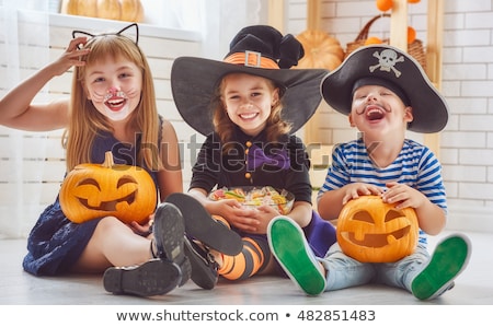 Foto d'archivio: Kids In Halloween Carnival Costumes