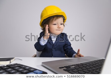 Stockfoto: Sweet Baby Boy Looking With Curiosity At Laptop Screen