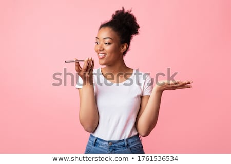 Stock foto: Woman Using Voice Assistant On Cellphone