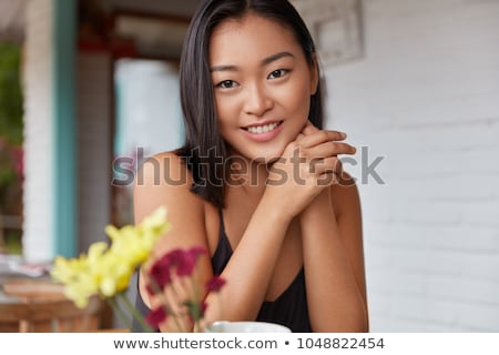 Stockfoto: Indoor Shot Of Pleased Attractive Woman With Dark Hair Healthy Soft Skin Drinks Coffee In Morning