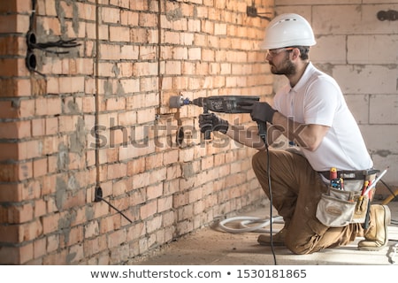 ストックフォト: Plumber Drilling