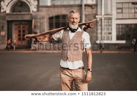 Foto stock: Man With Skateboard