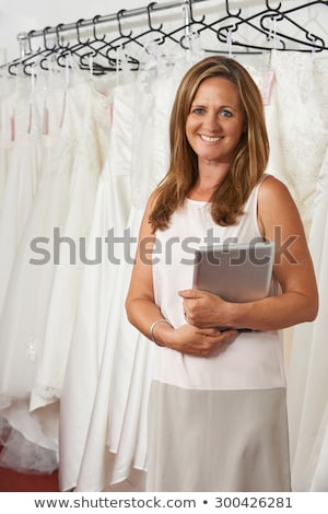 Stock photo: Portrait Of Female Bridal Store Owner With Digital Tablet