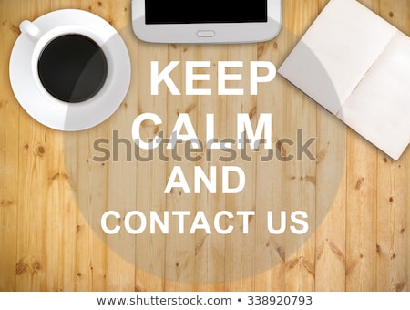 Foto stock: Keep Calm On Wooden Table