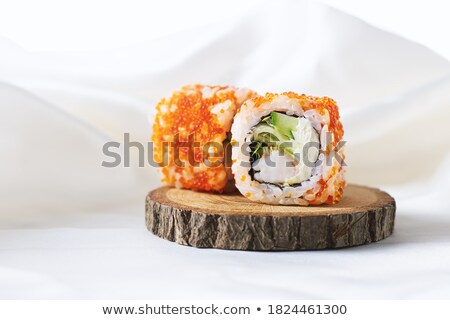 Foto d'archivio: Sushi Roll Of California With Chopsticks