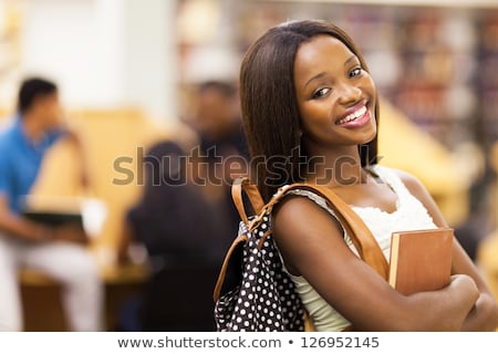 Сток-фото: Portrait Of A Smiling Young African Girl With Backpack