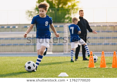 Kids Sports Teaching Children To Improve Soccer Skills ストックフォト © matimix