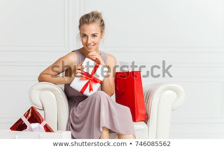 Stock photo: Red Haired Girl In Dress With Present Box