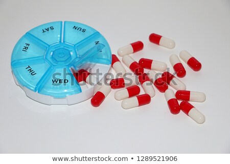 [[stock_photo]]: Isolated Pillboxes On White Background