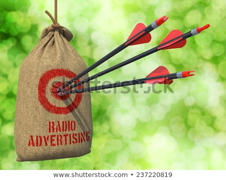 Сток-фото: Radio Advertising - Arrows Hit In Red Target