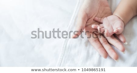 Stock fotó: Close Up Of Young Family With Little Baby Girl