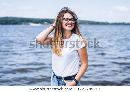 Zdjęcia stock: Long Haired Brunette Standing On White Background