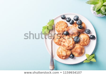 Stockfoto: Dutch Mini Pancakes Called Poffertjes