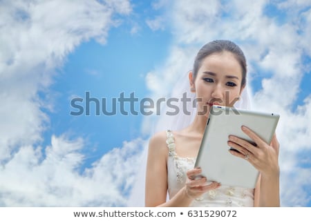 Zdjęcia stock: Young Bride At Blue Sky Background