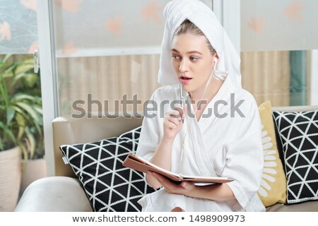 Foto stock: Portrait Of A Young Caucasian Businesswoman Sitting On The Floor With Arms Up And Laptop