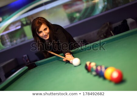 Stok fotoğraf: Beautiful Brunette At A Pool Table