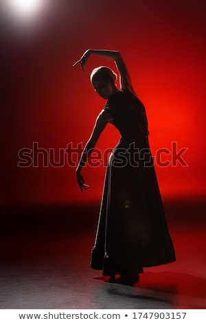 ストックフォト: Young Woman Dancing Flamenco On Black