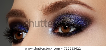 Stock fotó: Mascara Close Up Womans Eye With Golden Eyeshadow