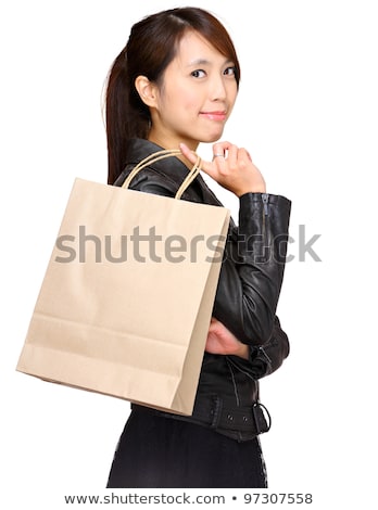 Happy Blonde tient des sacs en papier Photo stock © leungchopan